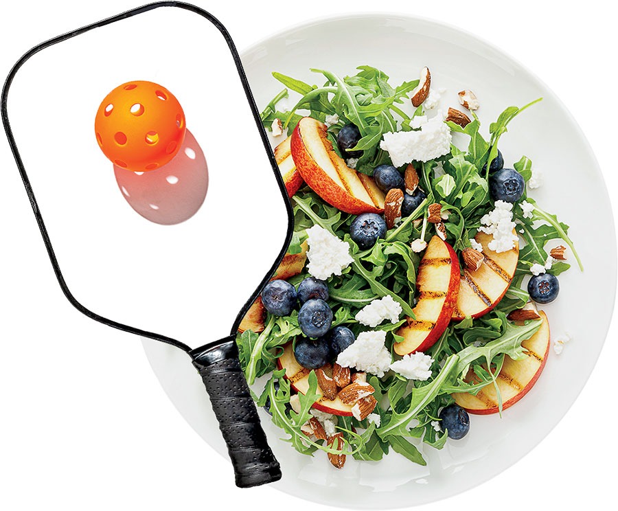 Pickleball paddle and a salad