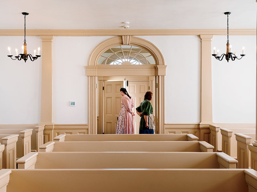 Missionaries in a Nauvoo church.