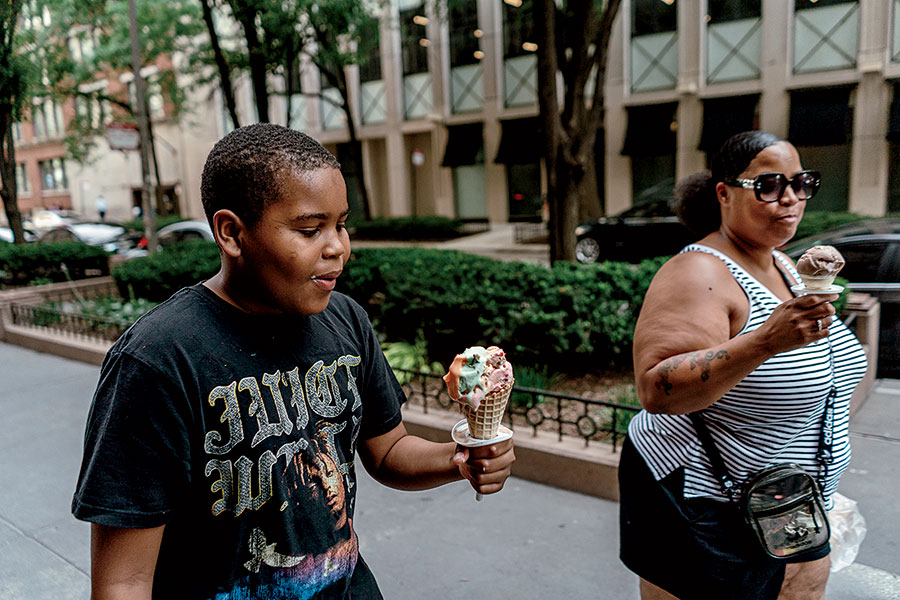 Zinida Moore, eating ice cream with her youngest son, Ryan.