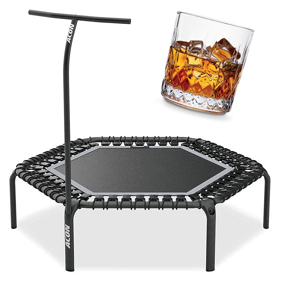 A trampoline and a drink in a whiskey glass