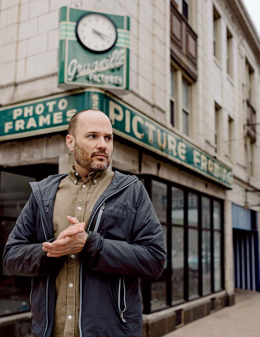 Steve Shanabruch standing in front of Granville Picture Framing and Gallery Arts