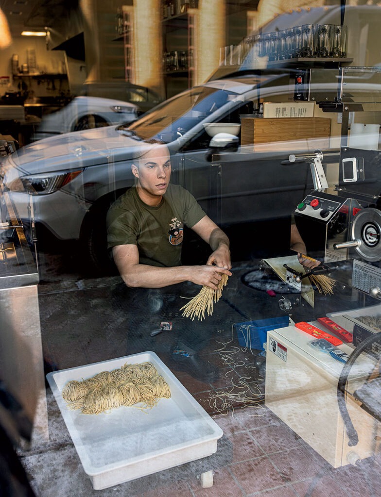 Mike Satinover prepping noodles in the see-thru kitchen.