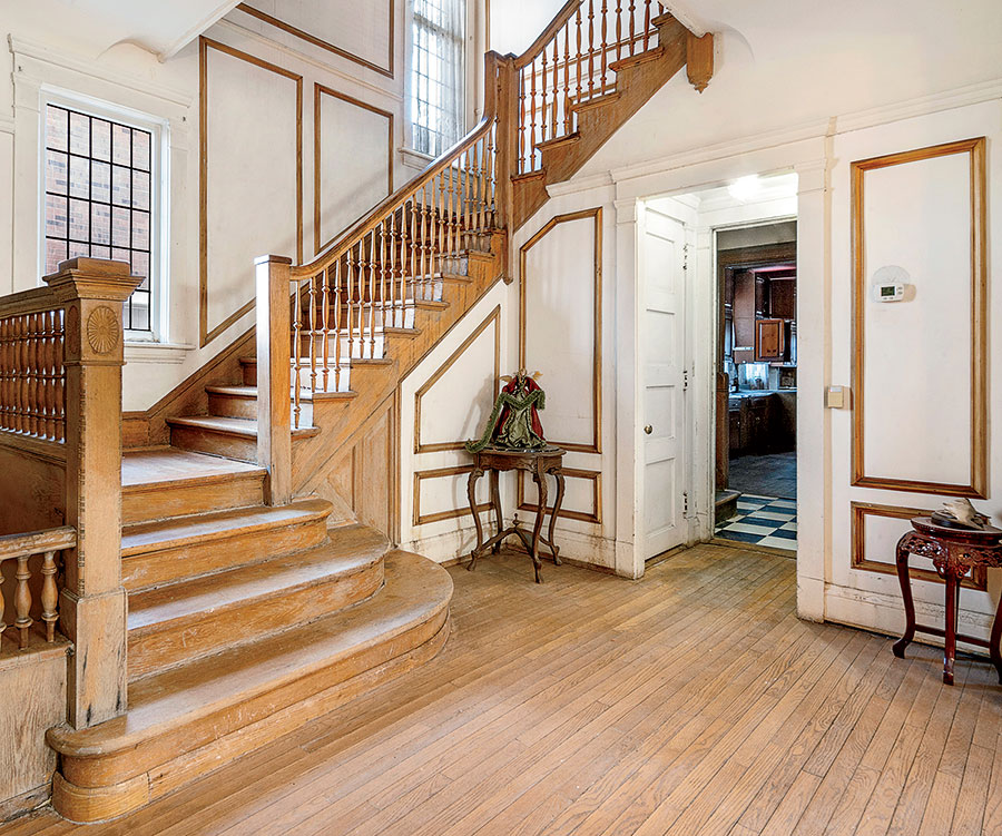 The staircase in the Kenwood home