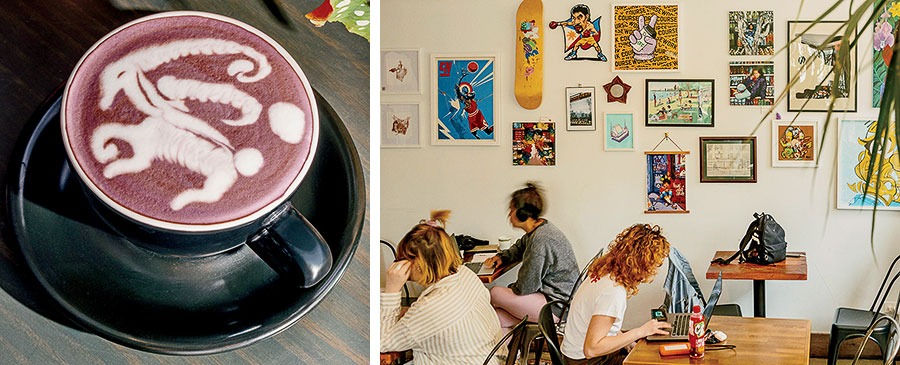 A cup of coffee with decorated foam and the dining area at Side Practice Coffee
