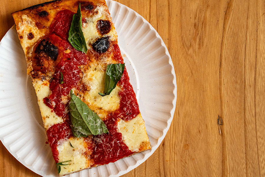 A slice of pizza from Pizza Dada