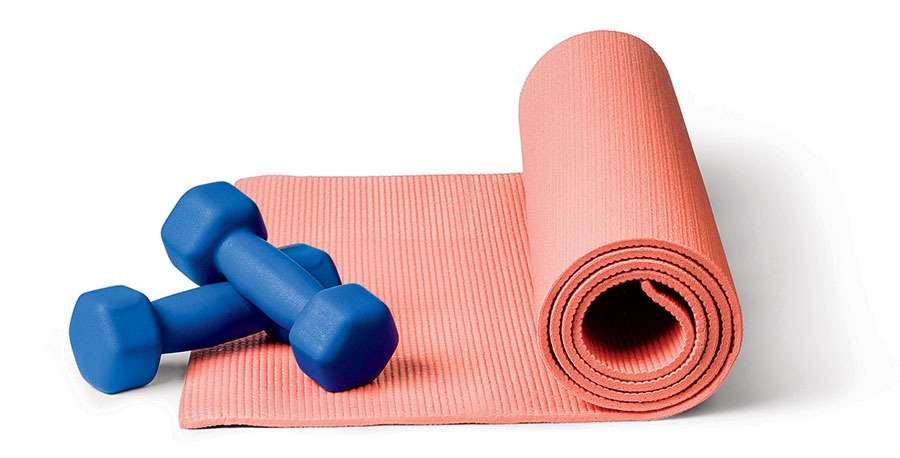 A pair of dumbbells and an exercise mat