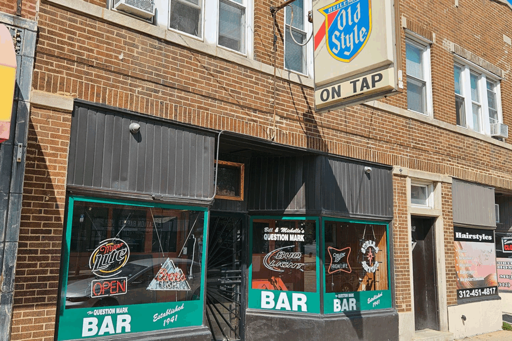 an old style sign on a chicago bar