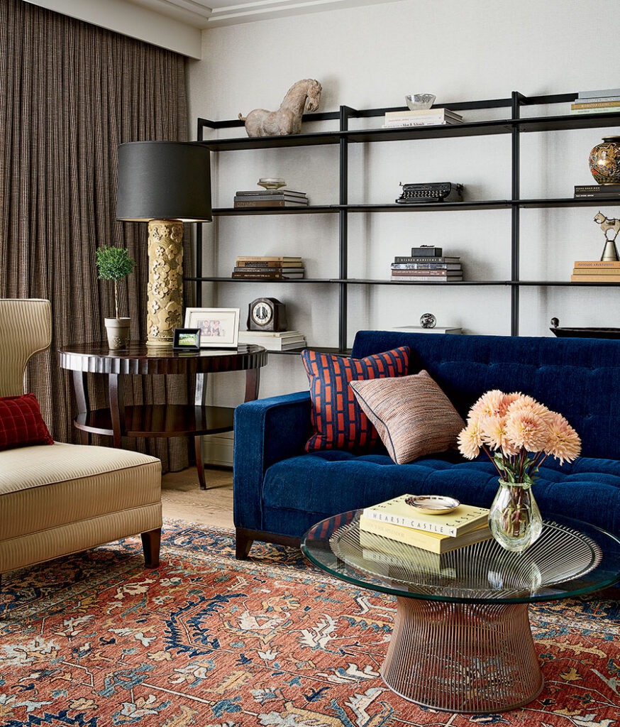 Wall units from Room & Board display travel collectibles in the Old Town home