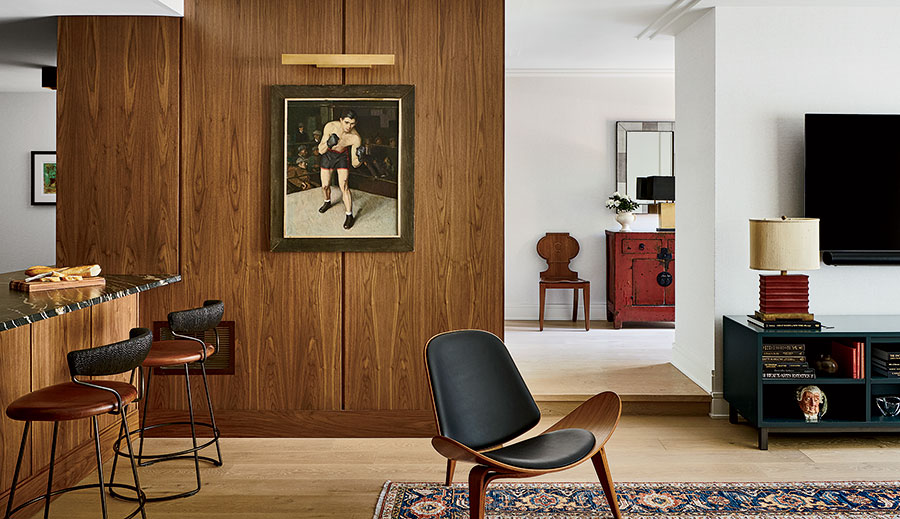 A vintage boxing painting in the living room of the Old Town home