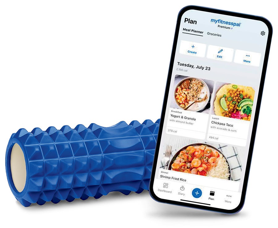 A foam roller and a phone displaying the MyFitnessPal app