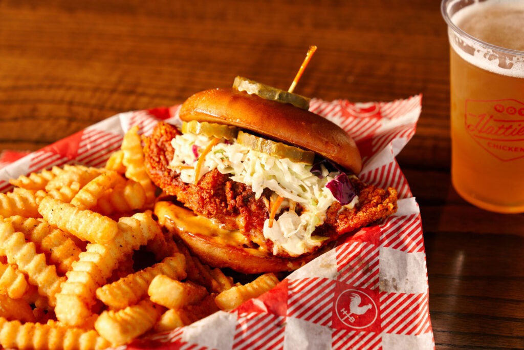 A chicken sandwich and crinkle-cut fries at Hattie B’s Hot Chicken