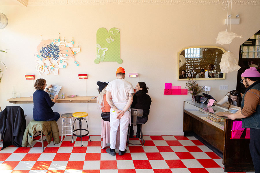 Diners chatting at the lunch counter at Txa Txa Club