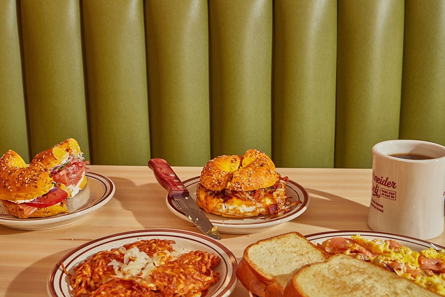 Sandwiches, other dishes, and a cup of coffee at Schneider Deli