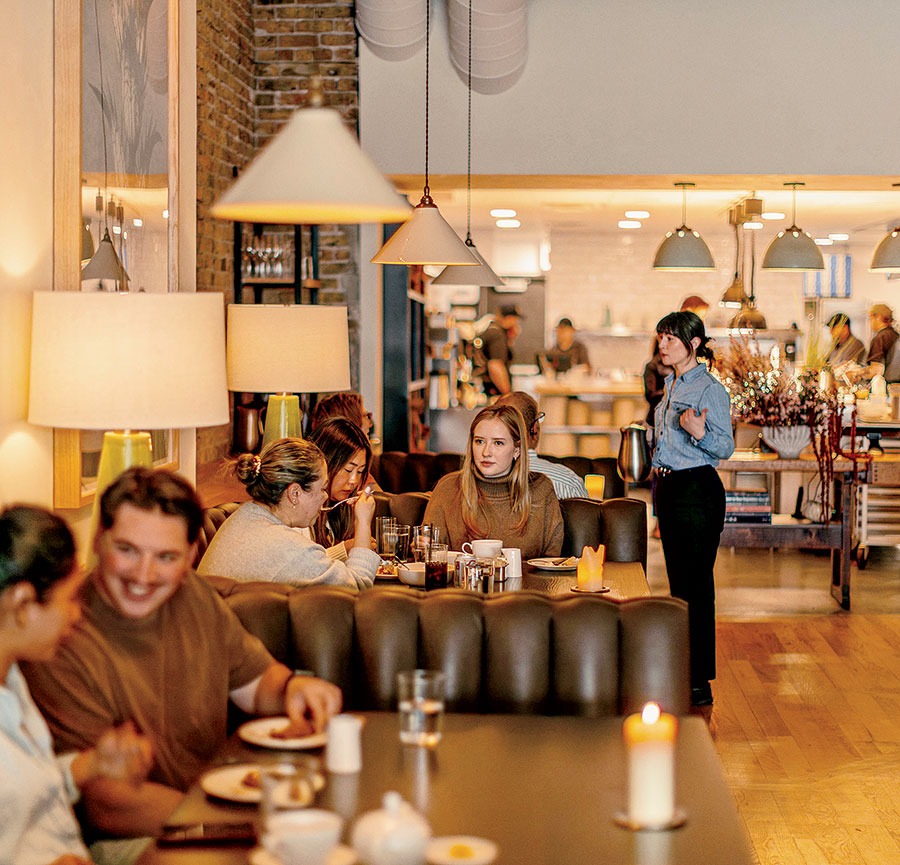 Diners eating in the dining area at Ox Bar & Hearth