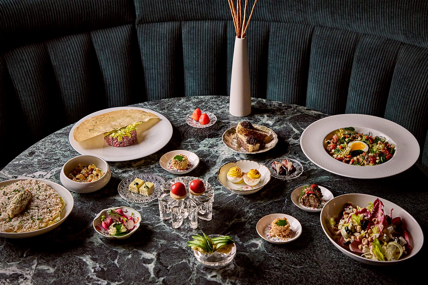 A variety of dishes displayed on a table at The Ives