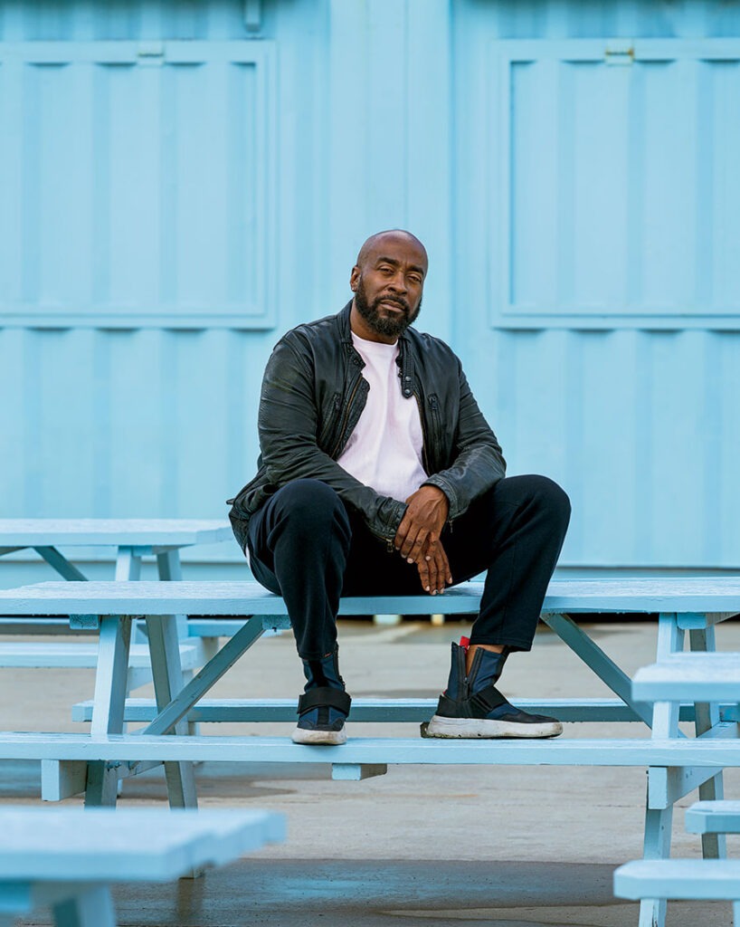Eric Williams seated on a bench